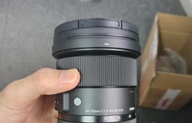 适马24-70一代镜头的性能与表现（探索适马24-70一代镜头的特点和优势）